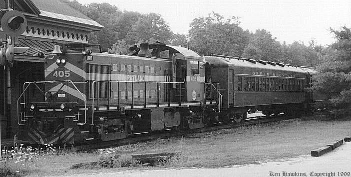 Photo of Rutland's 405 pulling a Green Mountain Flyer out of Chester, VT.