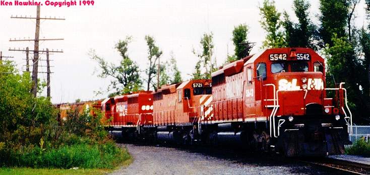 Photo of StL&H's 5542 leads a train into Rouses Point, NY.