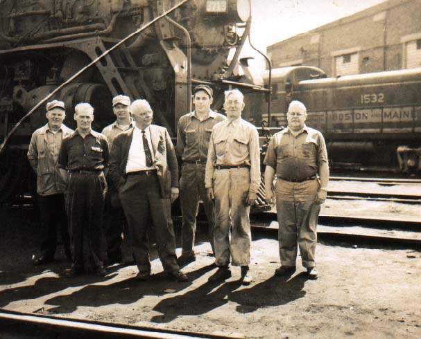 Photo of Oliver Lewis with a crew on the Boston & Maine