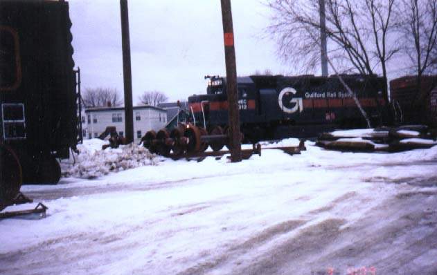 Photo of Guilford #312 passing by the Repair Facility