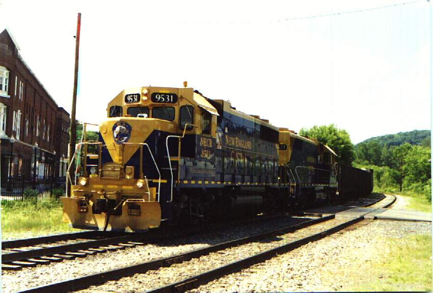 Photo of New England Central  local  arrives in White River  Jct ,Vt July 1997