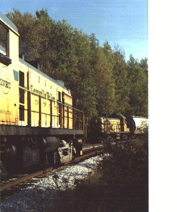 Photo of Two Lamoille Valley trains meet at Greensboro Bend, VT. Oct 7, 1984