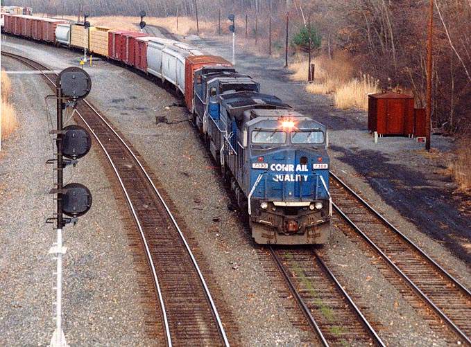 Photo of CSX(ex-Conrail) #7300 leads an eastbound at CP SK at Selkirk,NY11-99