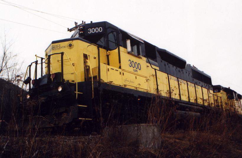 Photo of St. Lawrence and Atlantic RR 3000(LLPX) leads an RRE charter train.