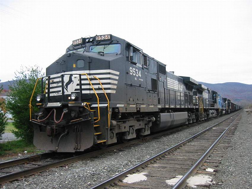 Photo of NS 9534, an C40-9W, with an empty coal train, NHB-69, at North Adams, MA.