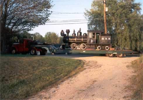 Photo of Monson Railroad #3 being pulled by my grandfather's tractor