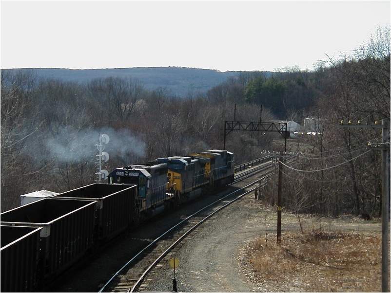 Photo of A CSX Bow coal with #7488 leading, #264 and #8244 depart East Deerfield