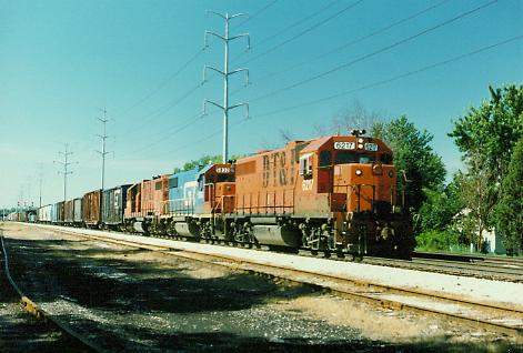 Photo of DT&I GP38 #6217 & GP38-2's #6221 & GT #5833; LaGrange, IL.