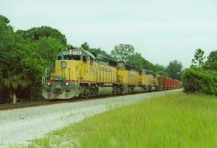 Photo of SD40-2's #706,705 & 701 nb aggregate train at Hobe Sound, FL.