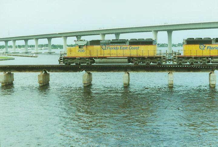 Photo of SD40-2's #706,705 & 701 nb aggregate train at Stuart, FL.
