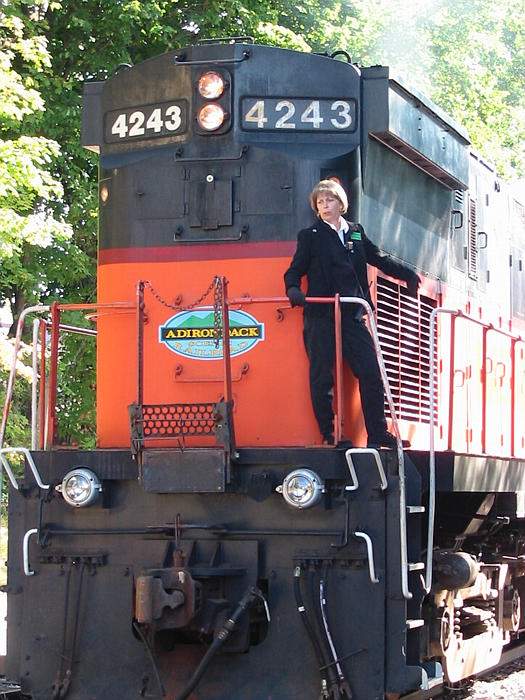 Photo of Adirondack Scenic Railroad hooking up at Saranac Lake NY