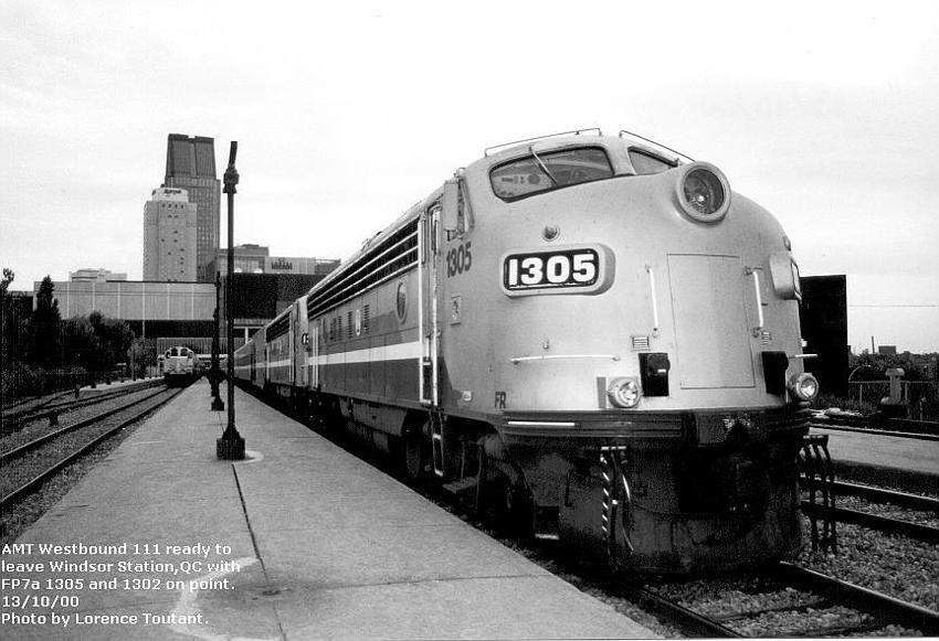 Photo of AMT FP7a #1305 ready to haul westbound #111 out of Montreal,PQ.