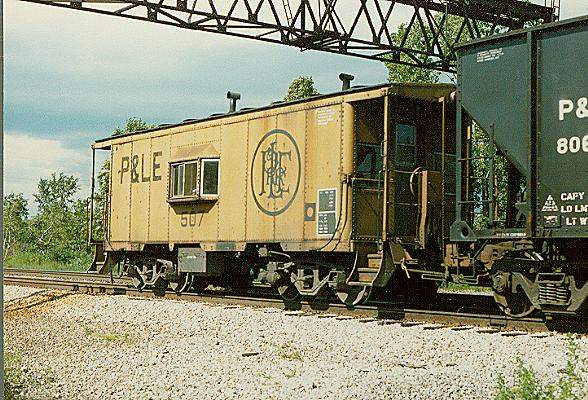 Photo of P&LE bay window caboose #507; end of coal train at Blasdell, NY.