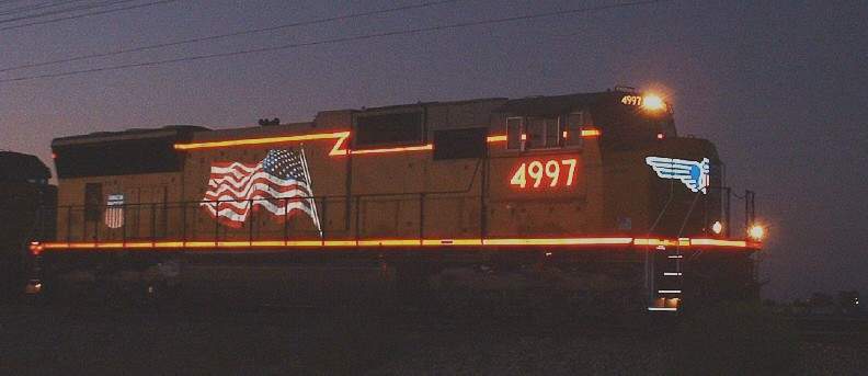 Photo of USA Flag  EastBound @ Maricopa AZ on the former Souther Pacific