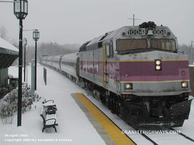 Photo of MBTA F40PH #1004 leads Downeaster at Dover.
