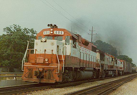 Photo of Frisco GP38-2 #686 leads 2 U25B's out of St. Louis, MO.