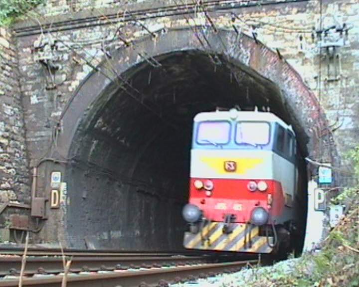 Photo of Italian Loc E656 out of one tunnel.