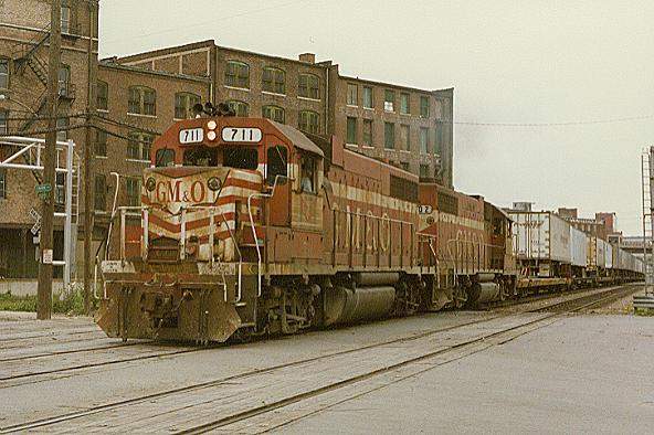 Photo of GP38's #711 & 702 run through the warehouse district of Kansas City, MO.