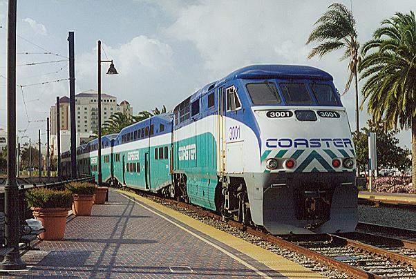 Photo of Coaster F59PHI #3001 pushing it's train out of the San Diego, CA station.