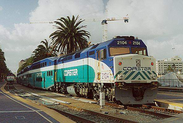 Photo of Coaster F40PHM-2 #2104 pushes it's train into the San Diego, CA station.