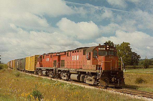Photo of GB&W C-424's #321 & 319 on the daily eastbound road freight at Hixton, WI.