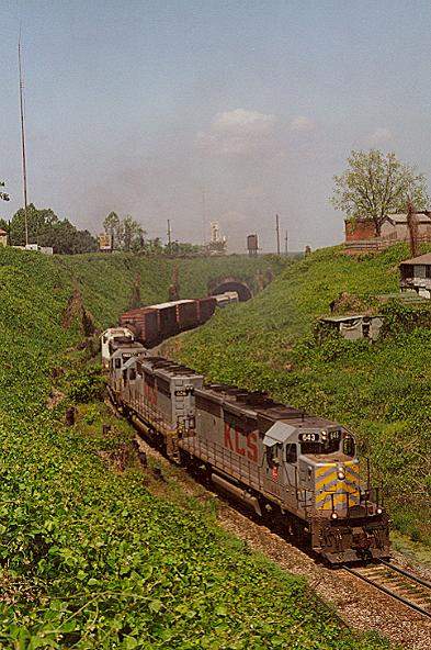 Photo of SD40-2 #643 leads an eastbound out of the tunnel at Vicksburg, MS.