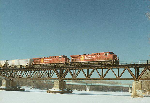 Photo of An eastbound crosses the Mississippi River at Minneapolis, MN.