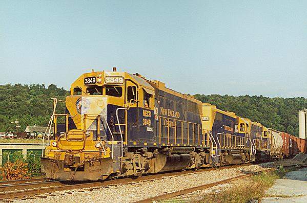 Photo of T#608 with GP38's #3849,3857 & 3851 stopping to switch the mill near Yantic, CT.