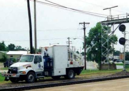 Photo of BNSF Hi-Rail truck at Galesburg, IL.