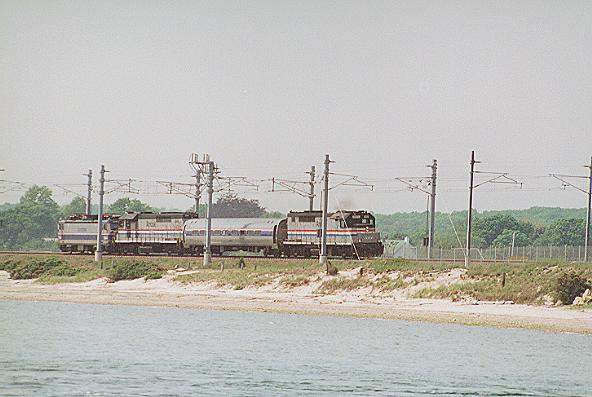 Photo of GP40TC #197 leads a catenary test train at Niantic, CT.