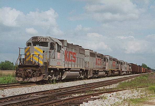 Photo of GP38-2 #4016 leads a westbound in the siding at Smiths Station, MS.