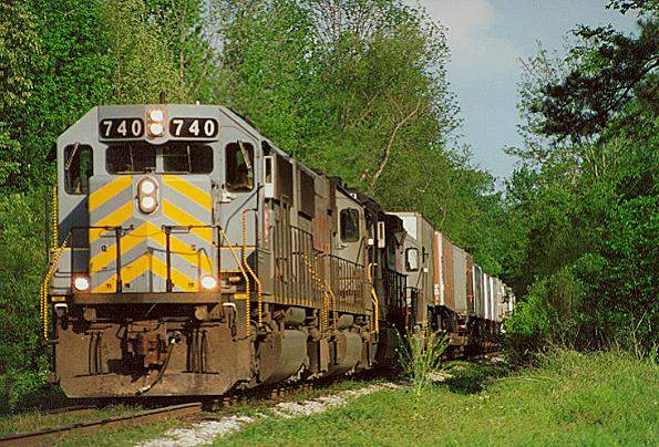 Photo of Train #8 led by SD60 #740 nears Oaks Yd at Greenfield, MS.