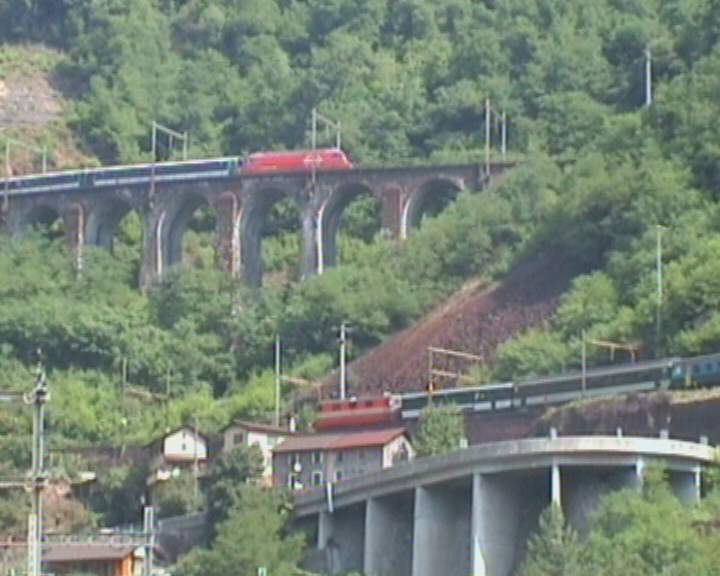 Photo of Two trains over Biaschina (CH)'s helix.