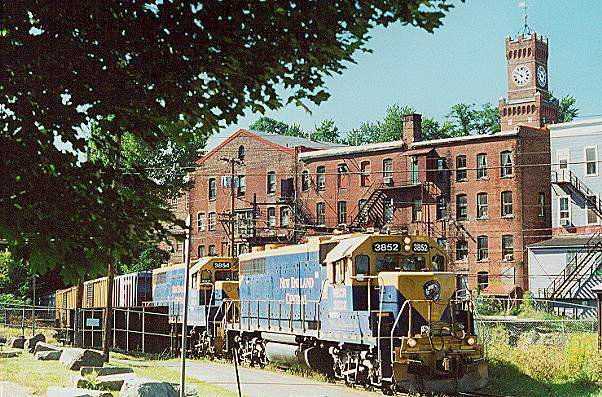Photo of T#323 with GP38's #3852 & 3854; just out of the tunnel at Bellows Falls, VT.