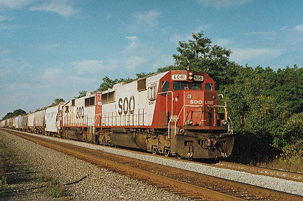Photo of SD60's #6041 & 6027; CP detour train eastbound on CSX at Westfield, NY.