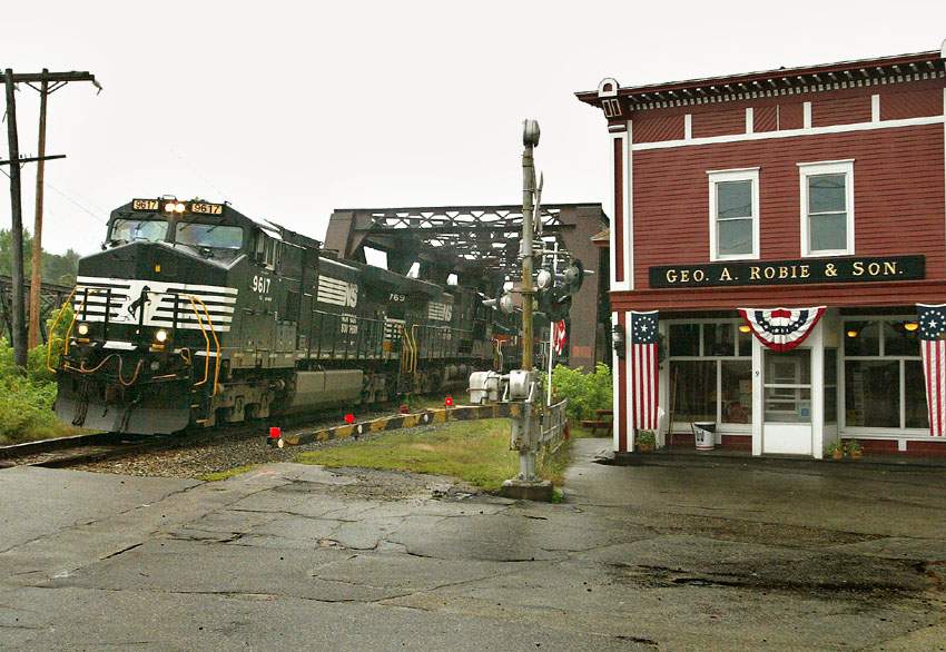 Photo of Bow coal train passing Robie's store.