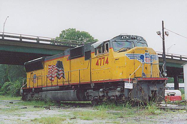 Photo of Ouch! SD70M #4774 out of service, with damage at Flomaton, AL.