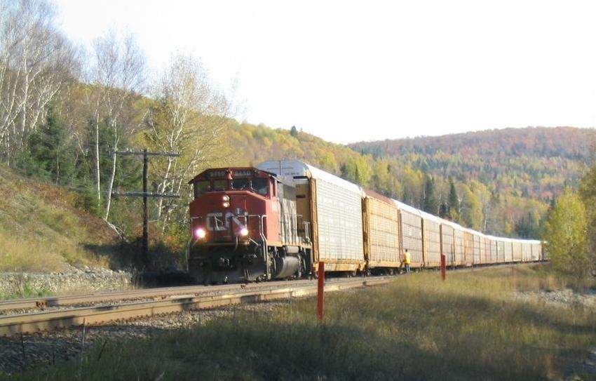 Photo of CN #305 taking the siding at MacKENIZE Siding