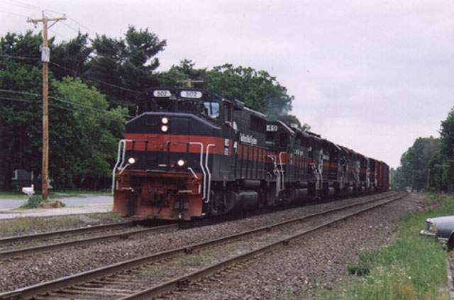 Photo of MEC 502 leads the same train through Shirley only minutes later.
