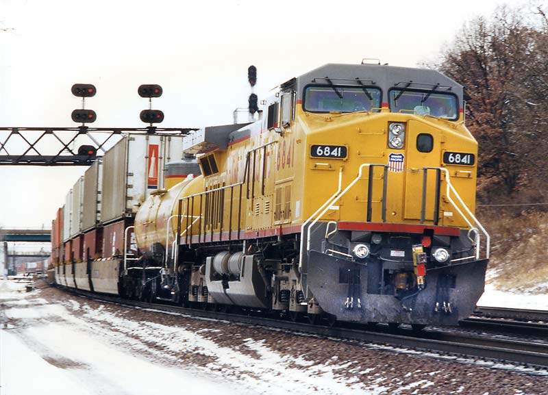 Photo of C44-AC 6841 with fuel tender at West Chicago.