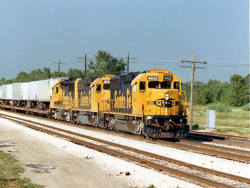 Photo of UPS train 991 heads West with GP60's on the point.