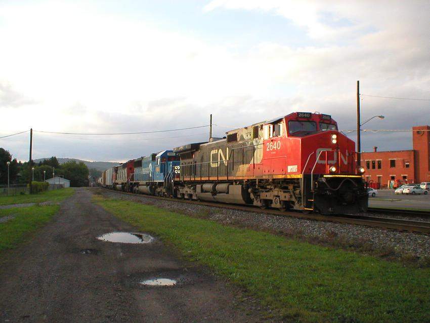 Photo of CN C44-9WL 2640, a Conrail SD, and a widebody CN SD move through Hornell.