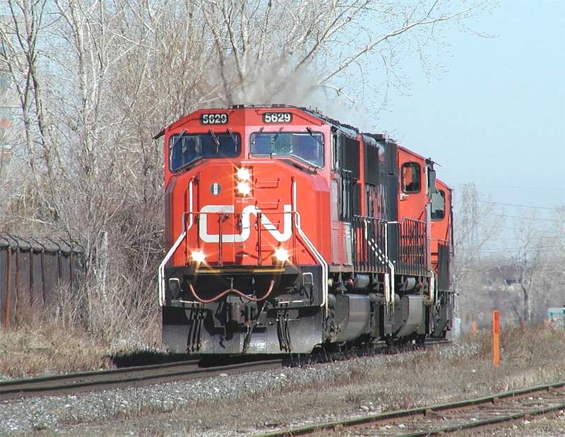 Photo of CN 5629 leads a light engine move through Ville St Laurent,Quebec