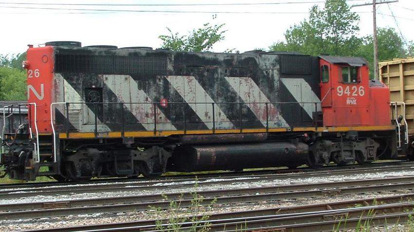 Photo of A side view of RPMX 9426 awaiting departure on NECR train 324