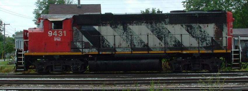 Photo of A side view of RPMX 9431 awaiting departure on NECR train 324