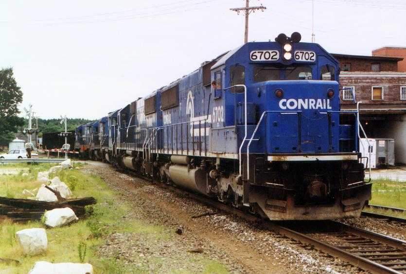 Photo of Conrail SD50 #6702 on the point of a loaded Bow at Nashua