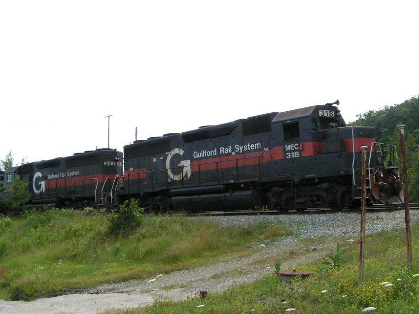 Photo of Two MEC Guilford Locomotives getting ready to leave IP Mill at Bucksport, ME.