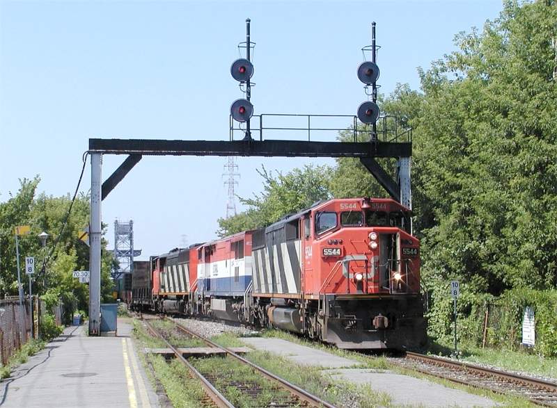 Photo of Eastbound CN SD60F 5544 at St Lambert, Quebec 01-Aug 2004