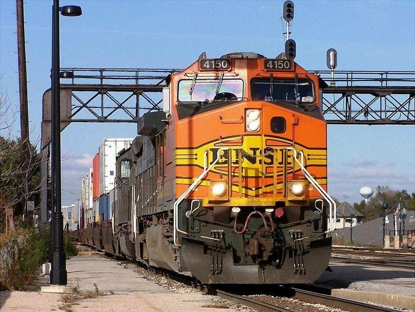 Photo of BNSF Dash 9 #4150, with a very rare SP SD40T-2 Tunnel Motor at Joliet
