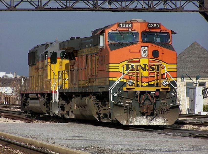 Photo of BNSF Dash 9  #4389 light with a UP SD60 at Joliet